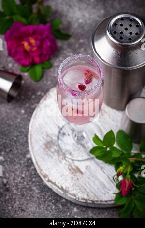 Pink cocktail with champagne and rose syrup Stock Photo