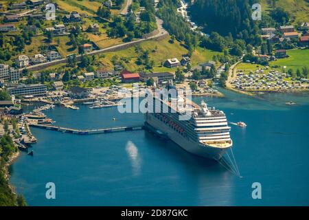 GeirangerFjord, local view Geiranger, ship MSC Orchestra at anchor, Møre og Romsdal, Norway, Scandinavia, Europe, adventure trip, mooring, boats, tour Stock Photo