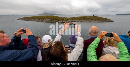 Northern Arctic Circle Globe, tourist photography Arctic Circle Globe, Vikingen Island, photographing tourists, Tonnes, Nordland, Norway, Scandinavia, Stock Photo