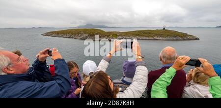 Northern Arctic Circle Globe, tourist photography Arctic Circle Globe, Vikingen Island, photographing tourists, Tonnes, Nordland, Norway, Scandinavia, Stock Photo