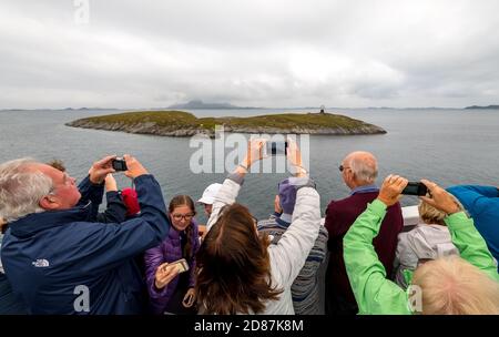 Northern Arctic Circle Globe, tourist photography Arctic Circle Globe, Vikingen Island, photographing tourists, Tonnes, Nordland, Norway, Scandinavia, Stock Photo