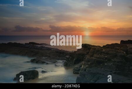 Sift velvet ocean sunrise with magnificent colours Stock Photo