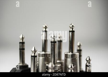Various jack or jack audio terminals on white background and in perspective Stock Photo