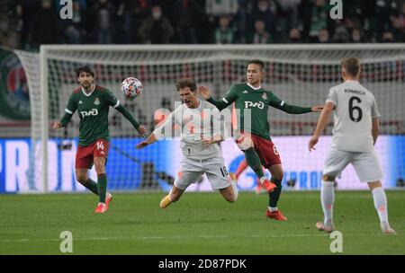 MOSCOW, RUSSIA - OCTOBER 27: Leon Goretzka of FC Bayern Muenchen is tackled by Daniil Kulikov of Lokomotiv Moskva during the UEFA Champions League Group A stage match between Lokomotiv Moskva and FC Bayern Muenchen at RZD Arena on October 27, 2020 in Moscow, Russia. (Photo by MB Media) Stock Photo