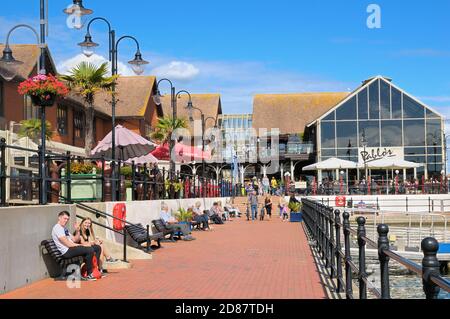 Bars and restaurants at The Waterfront development in Sovereign Harbour Marina, Eastbourne, East Sussex, England, UK Stock Photo