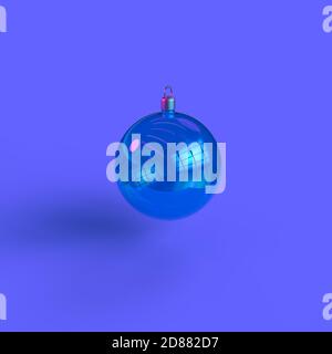 Blue glass Christmas ball with neon pink light floating on purple background. Holidays concept and minimalistic style. Seasonal decor Merry Christmas Stock Photo