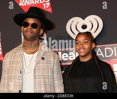 LOS ANGELES - MAR 5:  Ty Dolla Sign, daughter at the 2017 iHeart Music Awards at Forum on March 5, 2017 in Los Angeles, CA Stock Photo