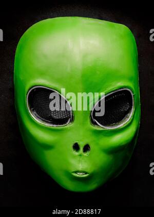 El Wire Alien Face Mask Isolated Against Black Background Stock Photo