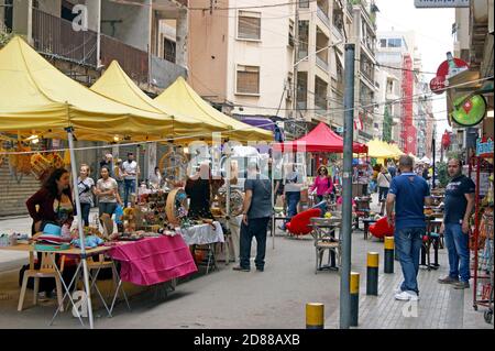 Lebanese enjoy a street fair in the Hamra neighborhood in Beirut, Lebanon. Stock Photo