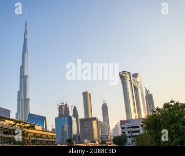 Dubai Financial Center road. Address Sky view hotel and Burj Khalifa tallest building in the world can be seen on the scene. Outdoors Stock Photo