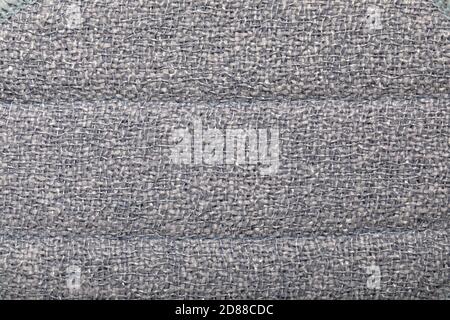 Grey fabric wicker texture. rough gray fabric with interlacing close-up as background Stock Photo