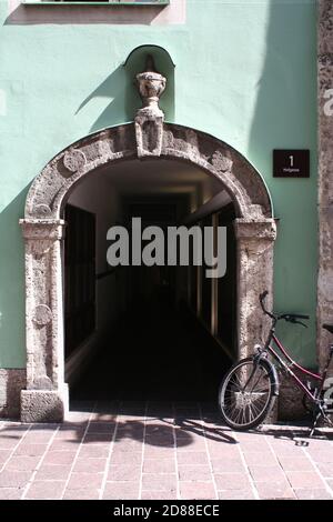 An old archway at Hofgasse 1 in Innsbruck, Tyrol, Austria Stock Photo