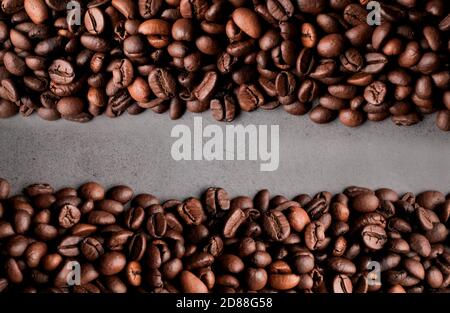 Coffee beans frames at dark gray background. Copy space  for your text Stock Photo