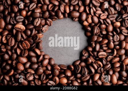 Coffee beans frames at dark gray background. Copy space  for your text Stock Photo