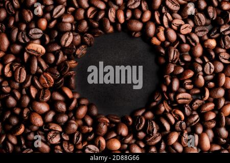 Coffee beans frames at dark gray background. Copy space  for your text Stock Photo