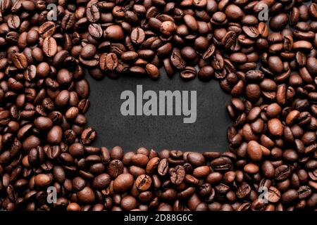 Coffee beans frames at dark gray background. Copy space  for your text Stock Photo