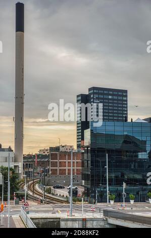 Modern industrial office building facade with stacked windows and metal ...