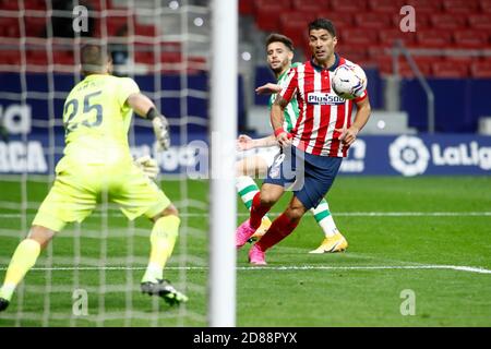 Luis Suarez of Atletico de Madrid and Claudio Bravo of Real Betis in action during the Spanish championship La Liga football match between Atletico  C Stock Photo