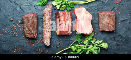Italian meat platter.Cured meat and sausages.Long banner Stock Photo