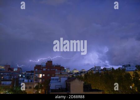 Electric storm over a neighbourhood in Barcelona. Catalonia. Spain. Stock Photo