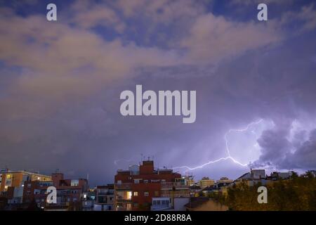 Electric storm over a neighbourhood in Barcelona. Catalonia. Spain. Stock Photo