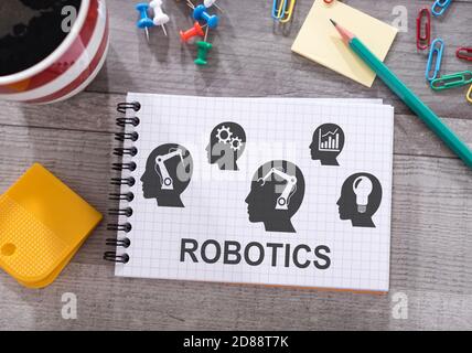 Robotics concept drawn on a notepad placed on a desk Stock Photo