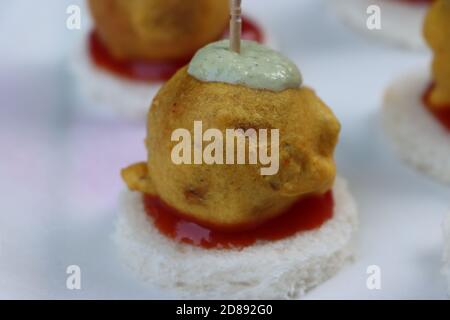 Mini vada Pav, restaurant style version of  roadside fast food dish from Maharashtra, India, starter or appetizer Stock Photo