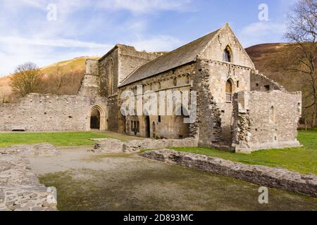 Valle Crucis Abbey was founded in 1201 as a Cistercian monastery and closed in 1537 a prominent landmark in the vale of Llangollen  North Wales Stock Photo