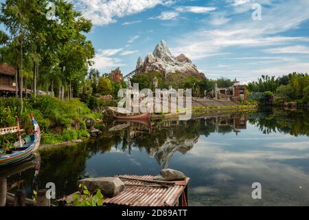 View across the lake to Expedition Everest - Legend of the Forbidden Mountain, Disney's Animal Kindom Theme Park, Florida Stock Photo