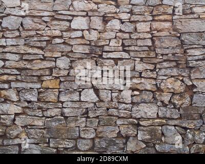 Old fence gray stone wall texture Stock Photo