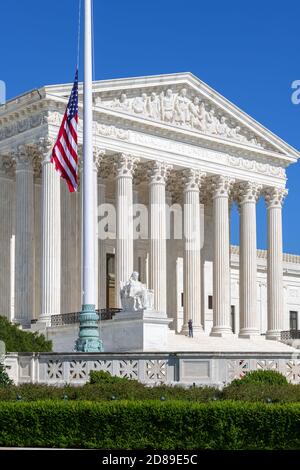 The Stars & Stripes flag flies at half mast at the Supreme Court of the United States in Washington, DC. Stock Photo