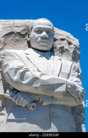 With arms folded, Lei Yixin's 9 metre 'Stone of Hope' statue of Martin Luther King, Jr. looks out over the Tidal Basin from West Potomac Park. Stock Photo