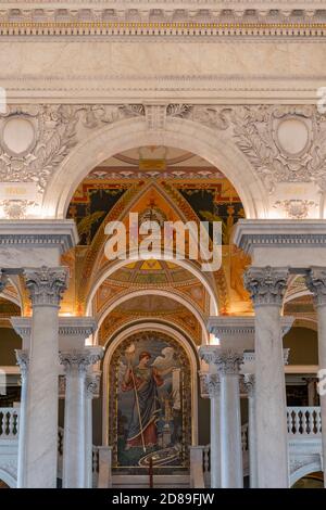 A series of arches through the Great Hall of the Library of Congress lead to Elihu Vedder's 1896 mosaic of Minerva, Roman goddess of learning Stock Photo