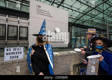 London, UK.  28 October 2020.  Anti-Brexit protesters from SODEM stage a Halloween-themed demonstration outside the Department for Business, Energy & Industrial Strategy in Westminster.  Michel Barnier, the European Commission's Head of Task Force for Relations with the United Kingdom, is attending meetings inside.  Credit: Stephen Chung / Alamy Live News Stock Photo
