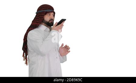 Arabian businessman recording voice message or using voice digit Stock Photo