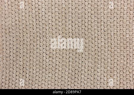 Beige knitting texture background, warm blanket. Good pattern for design. Stock Photo