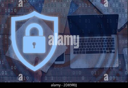 Business Cyber Security. Laptop on table with padlock icon Stock Photo