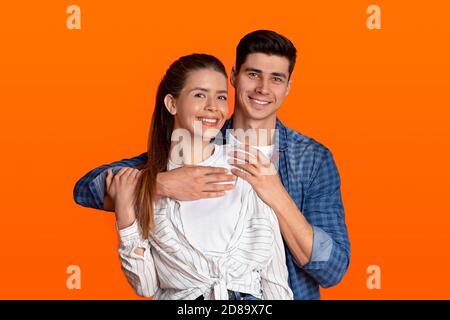 Hugs of couple in love and spend free time together during covid-19 quarantine Stock Photo