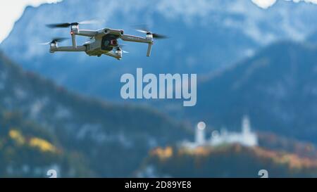 DJI Mavic Air 2 drone in the Air in the alps Stock Photo