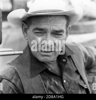 CLARK GABLE on set location candid being interviewed during break in filming of THE MISFITS 1961 director JOHN HUSTON screenplay ARTHUR MILLER Seven Arts Productions / United Artists Stock Photo