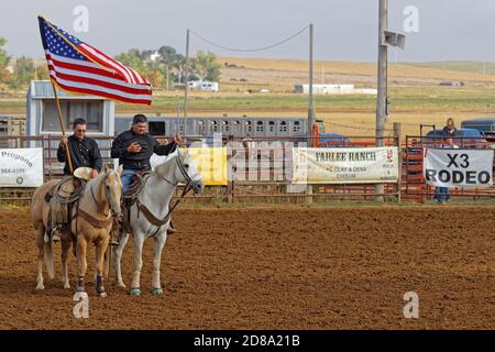 DUPREE, SOUTH DAKOTA, September 15, 2018 : Grand Entry of a regional Rodeo in Dupree. Rodeo is a competitive sport that arose out of the working pract Stock Photo