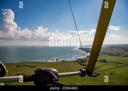 Tandem motor paragliding over Black Sea shores near town of Ahtopol. Sunny autumn day, scenery colors and amazing landscapes and seascapes, Bulgaria Stock Photo