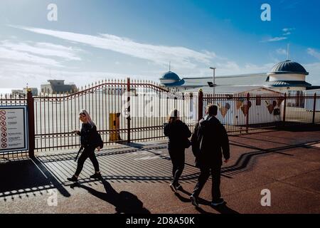 The gates of a deserted Hastings Pier. Stock Photo