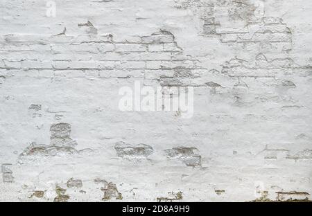White brick wall background. Weathered plaster texture Stock Photo
