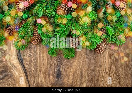 Christmas decoration colorful lights on wooden background Stock Photo