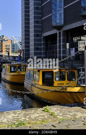 LEEDS, UNITED KINGDOM - Aug 08, 2020: Vertical shot of leeds water taxis docked during the covid 19 pandemic Stock Photo