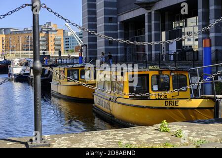 LEEDS, UNITED KINGDOM - Aug 08, 2020: Horizontal shot of leeds water taxis docked during the covid 19 pandemic Stock Photo