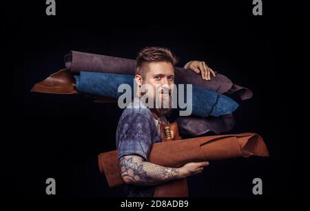 Leather Skinner produces a good product in his work area Stock Photo