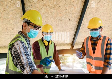 Construction Teamwork, Team of engineer and architects working join hands to build successful projects, Teamwork in construction site. Stock Photo