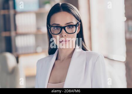 Closeup photo of attractive beautiful business lady eyesight health care concept look clever smart eyes camera home spacious office social distance Stock Photo
